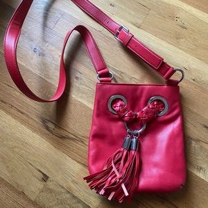 Michael Kors Red Leather Crossbody Bag with Fringe Tassels and Silver Grommets